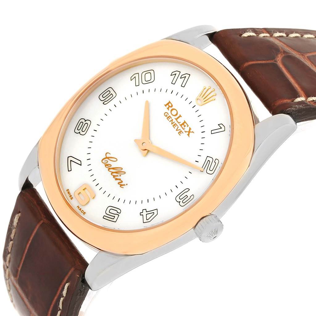 The image shows a Rolex Cellini 4233 Men
s White Gold White Dial 4233 Men
s White Gold White Dial watch from a slightly tilted front angle, highlighting its face, crown, and leather strap.