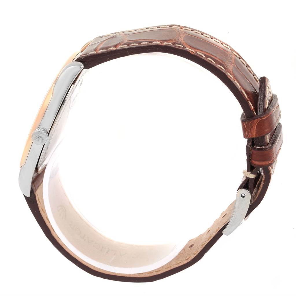 The image shows a side view of the Rolex Cellini 4233 Men
s White Gold White Dial 4233 Men
s White Gold White Dial watch featuring a brown leather strap and metal case.