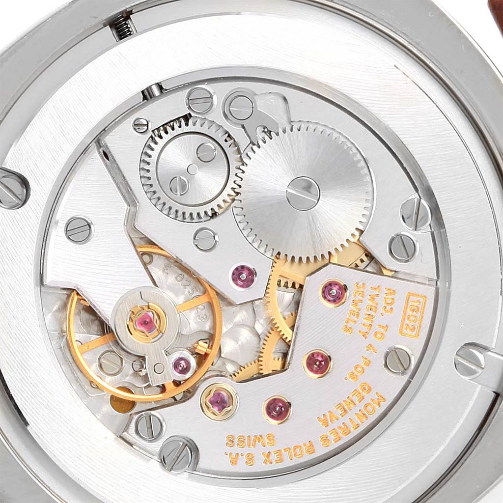 This close-up angle shows the intricate movement and internal mechanics of the Rolex Cellini 4233 Men
s White Gold White Dial 4233 Men
s White Gold White Dial watch.