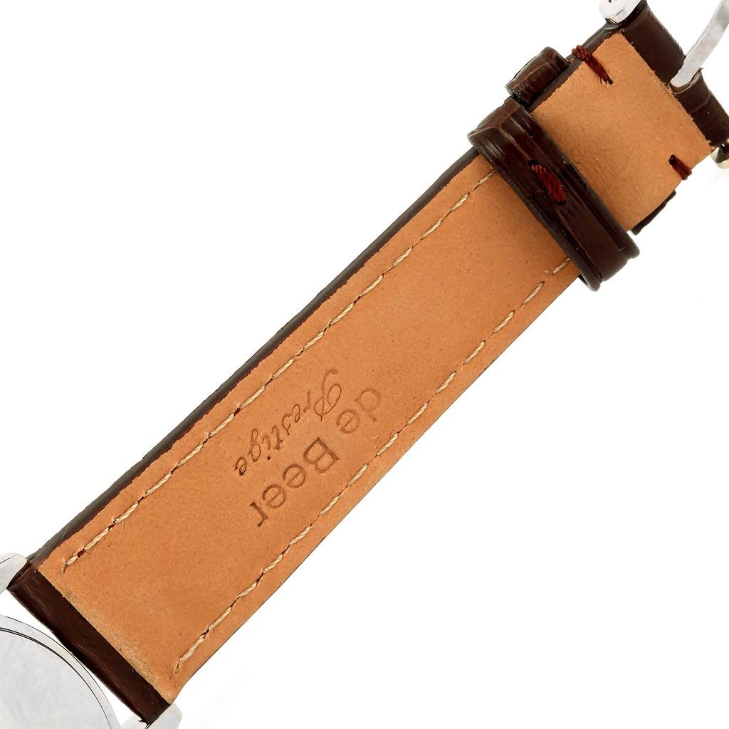 This image shows the leather strap of a Rolex Cellini 4233 Men
s White Gold Black Dial 4233 Men
s White Gold Black Dial watch from a top angle.