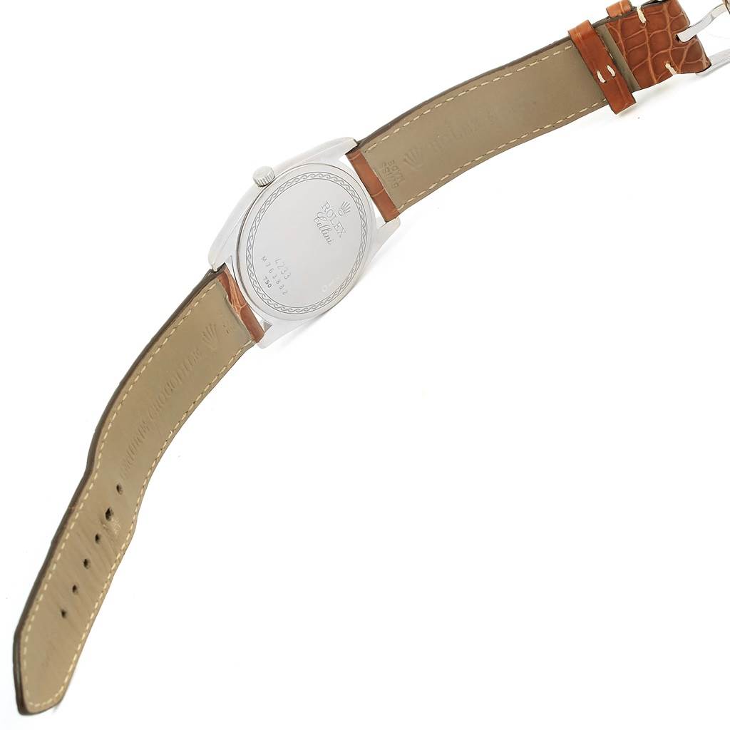 This image shows the back and strap of a Rolex Cellini 4233 Men
s White Gold Black Dial 4233 Men
s White Gold Black Dial watch from an overhead angle.