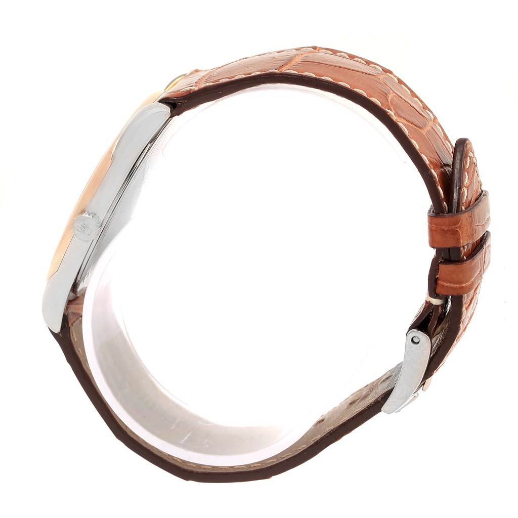 The Rolex Cellini 4233 Men
s White Gold Black Dial 4233 Men
s White Gold Black Dial watch is shown from the side, displaying its leather strap and buckle.