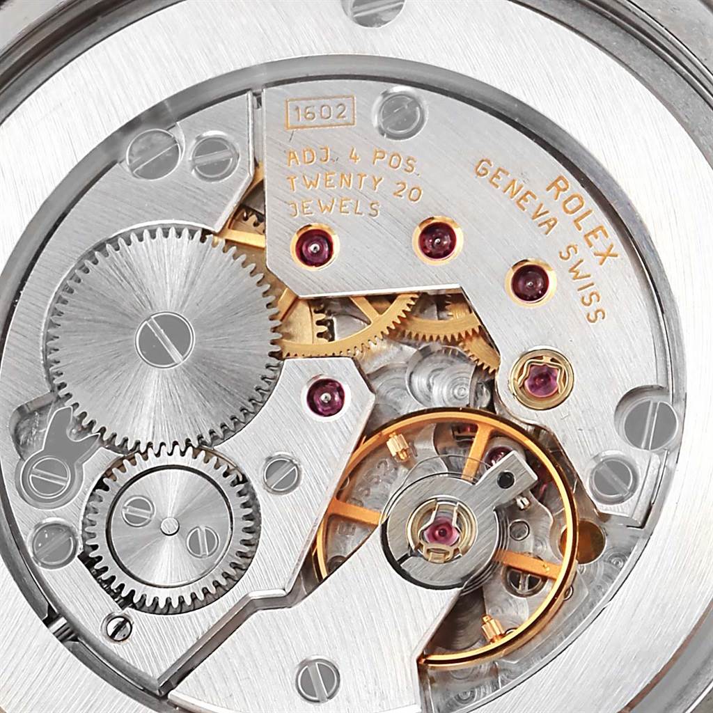 This image shows a close-up of the inner movement mechanism of the Rolex Cellini 4233 Men
s White Gold Black Dial 4233 Men
s White Gold Black Dial watch.