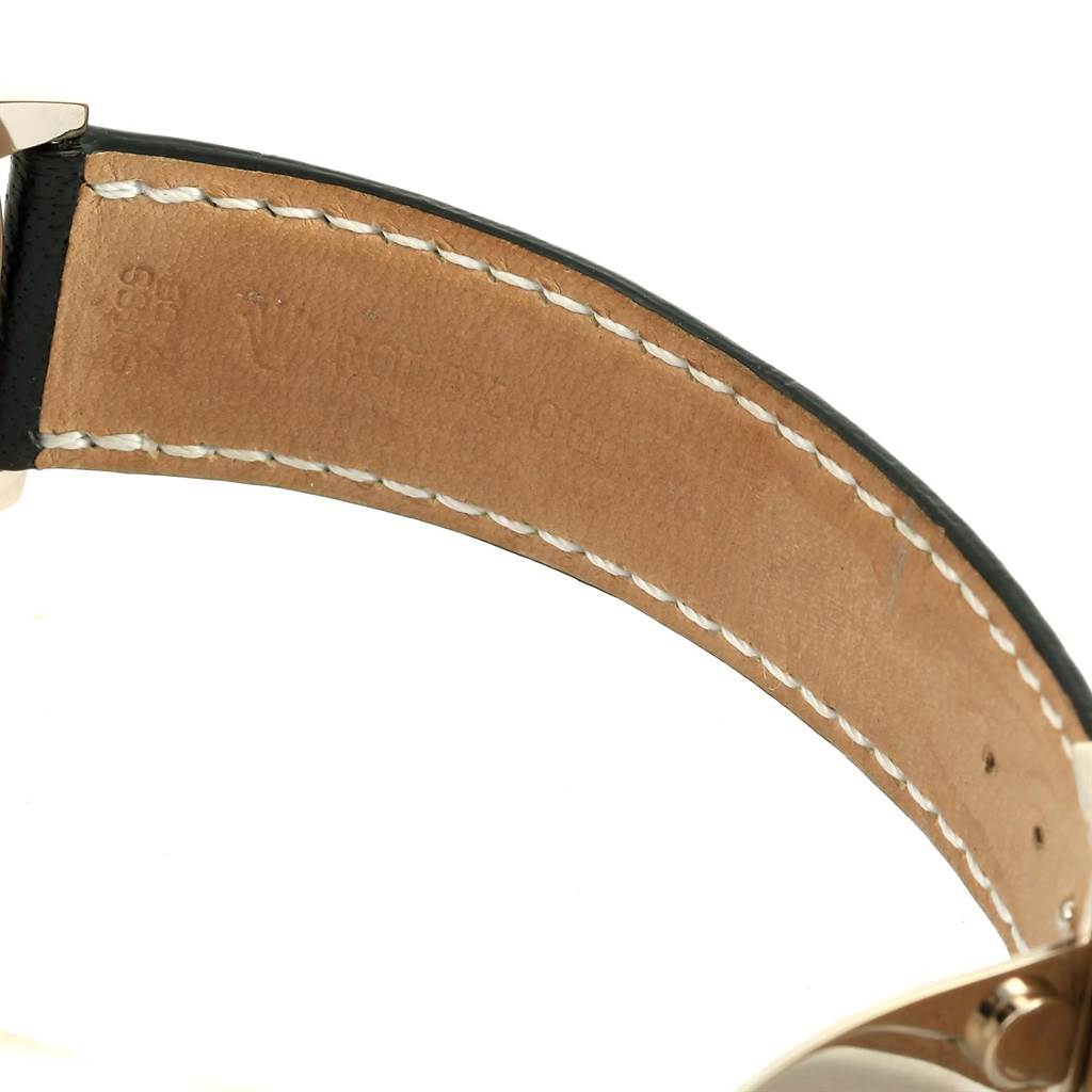 This image shows the inner side of the leather strap of a Rolex Cellini 4243 Men's White Gold White Dial 4243 Men's White Gold White Dial watch, angled to highlight the stitching and branding.