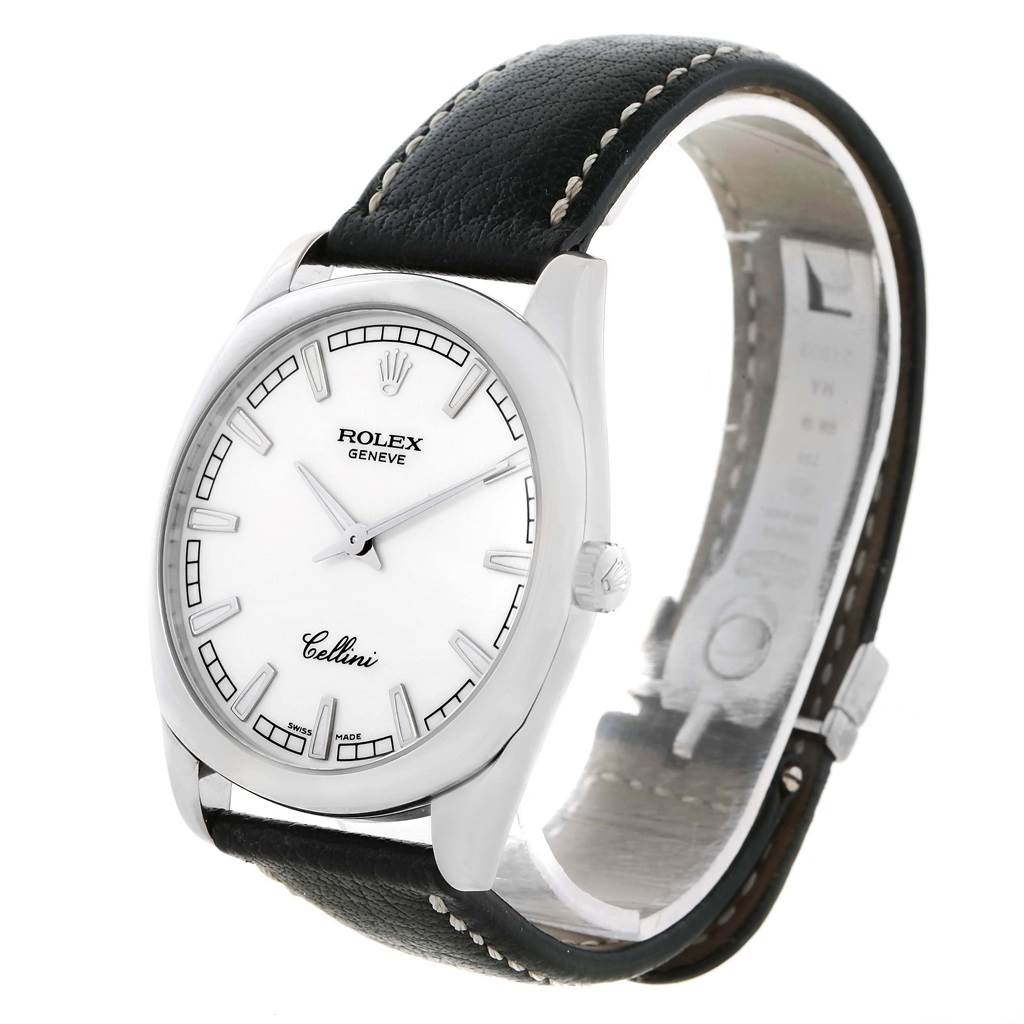 This image shows a Rolex Cellini 4243 Men's White Gold White Dial 4243 Men's White Gold White Dial watch from a front-left angle, highlighting its face, case, and leather strap.