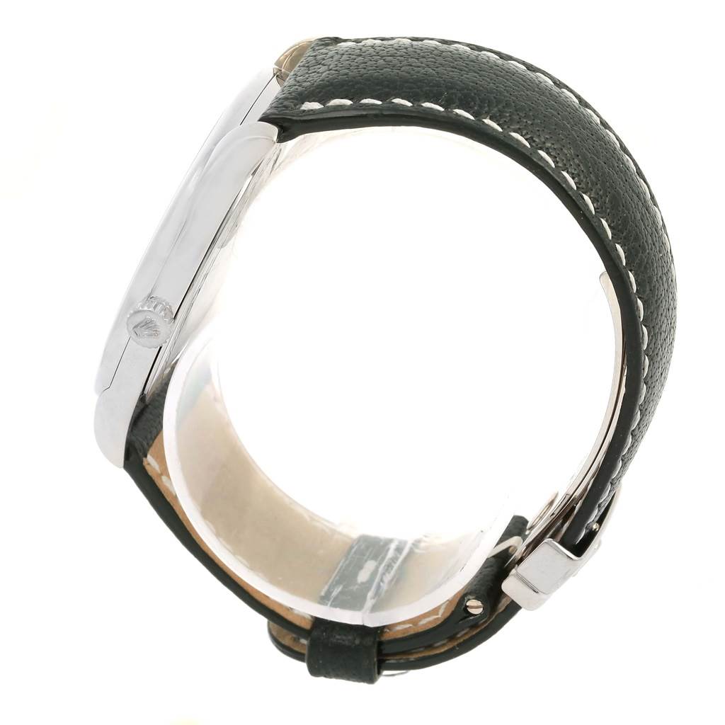 The image shows a side view of the Rolex Cellini 4243 Men's White Gold White Dial 4243 Men's White Gold White Dial watch, highlighting its case, crown, and leather strap.