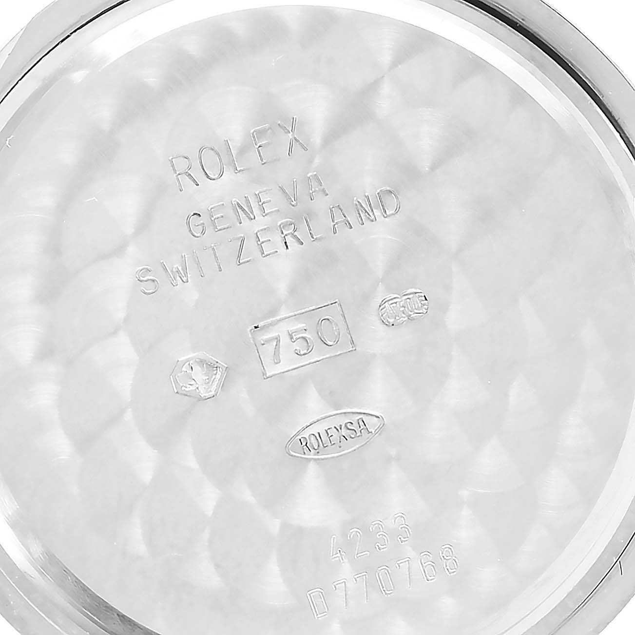 The image shows the inside case back of a Rolex Cellini 4233 Men
s White Gold Black Dial 4233 Men
s White Gold Black Dial watch, engraved with brand details and markings.