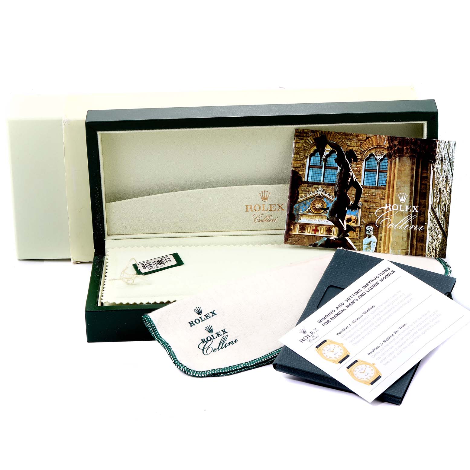 The image shows the open box, user manual, and a soft cleaning cloth for the Rolex Cellini 4233 Men
s White Gold Black Dial 4233 Men
s White Gold Black Dial watch.