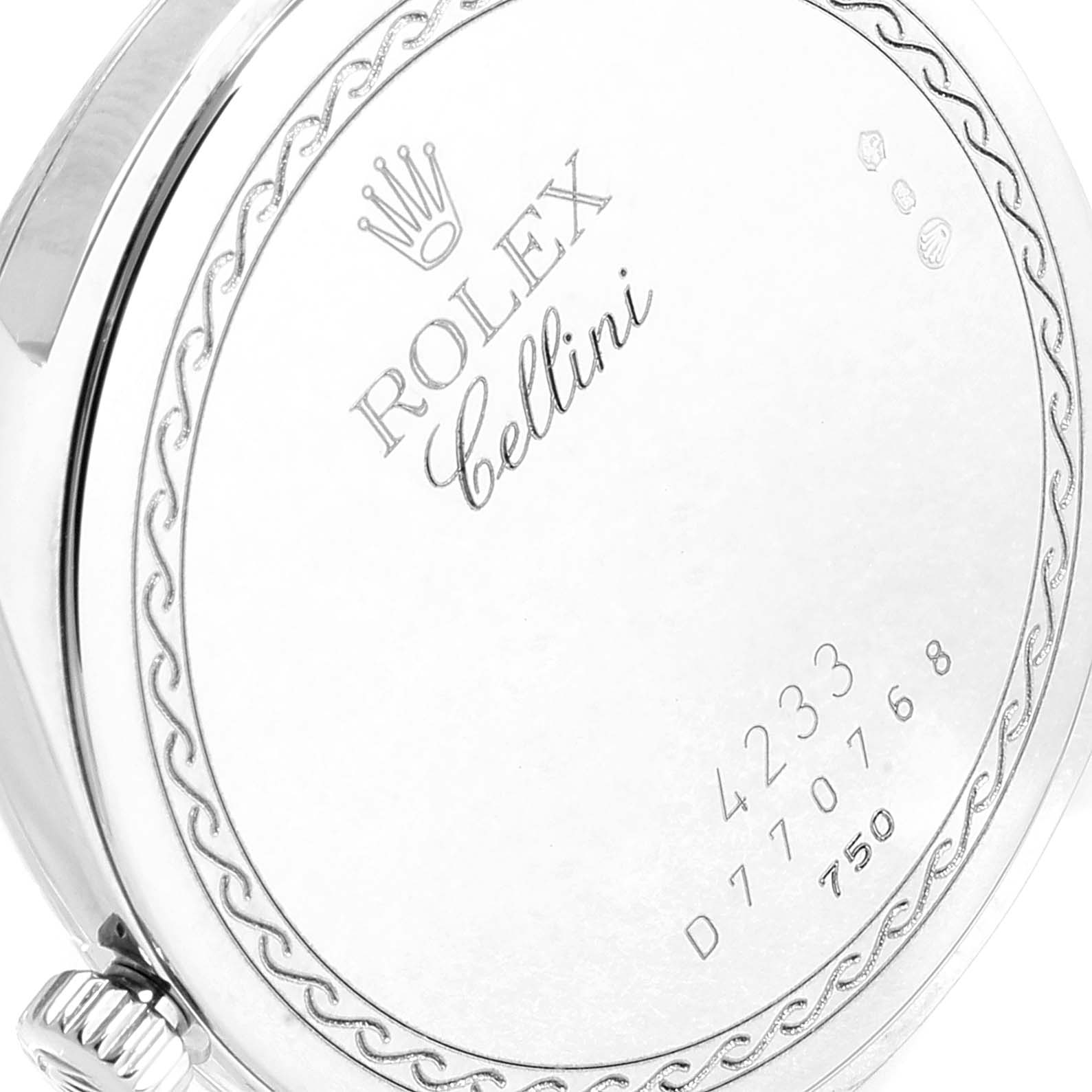 This is a close-up of the back of a Rolex Cellini 4233 Men
s White Gold Black Dial 4233 Men
s White Gold Black Dial watch, showing the engraved logo, model details, and serial numbers.
