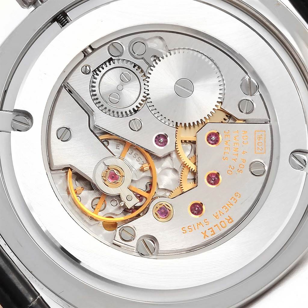 This image shows the intricate inner mechanical parts and movement of a Rolex Cellini 4233 Men
s White Gold Black Dial 4233 Men
s White Gold Black Dial watch from a back angle.