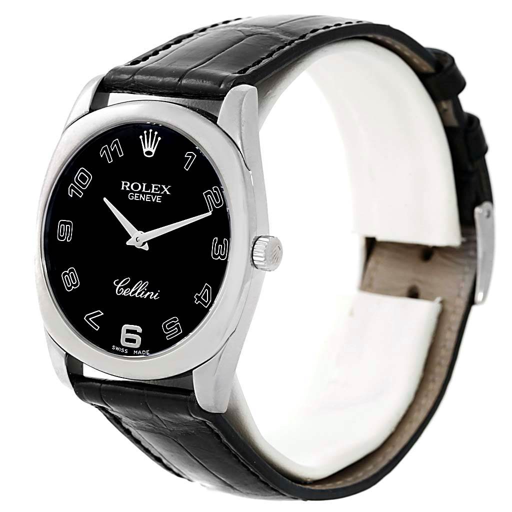 The Rolex Cellini 4233 Men's White Gold Black Dial 4233 Men's White Gold Black Dial watch is shown at a 3/4 angle, displaying the face, case, crown, and leather strap.