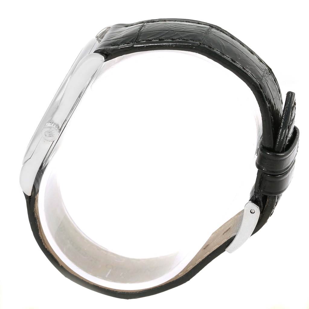 The image shows a side view of a Rolex Cellini 4233 Men's White Gold Black Dial 4233 Men's White Gold Black Dial watch with its black leather strap and buckle visible.