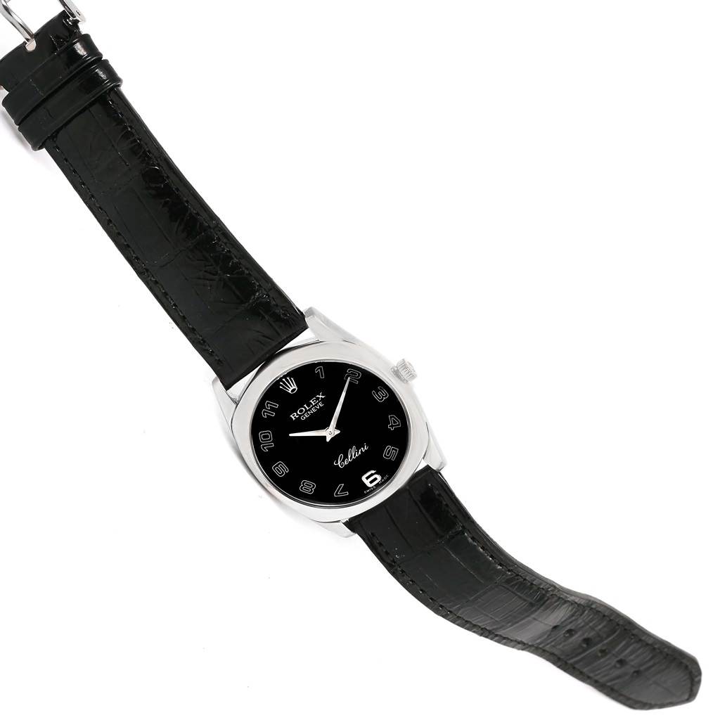 The image shows a top-down view of a Rolex Cellini 4233 Men's White Gold Black Dial 4233 Men's White Gold Black Dial watch, displaying its black dial and black leather strap.
