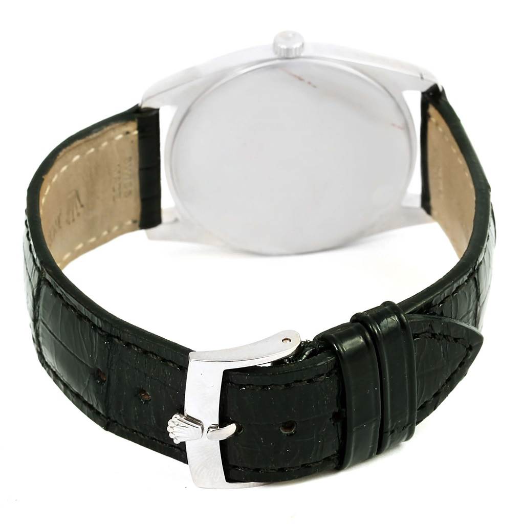 The image shows the back side of a Rolex Cellini 4233 Men's White Gold Black Dial 4233 Men's White Gold Black Dial watch, highlighting the case back and leather strap with buckle.