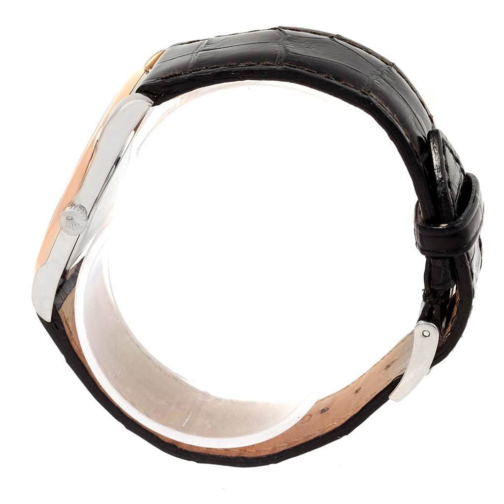 This image shows a side view of the Rolex Cellini 4233 White Gold Black Dial 4233 White Gold Black Dial watch, highlighting its black leather strap and part of its side casing.