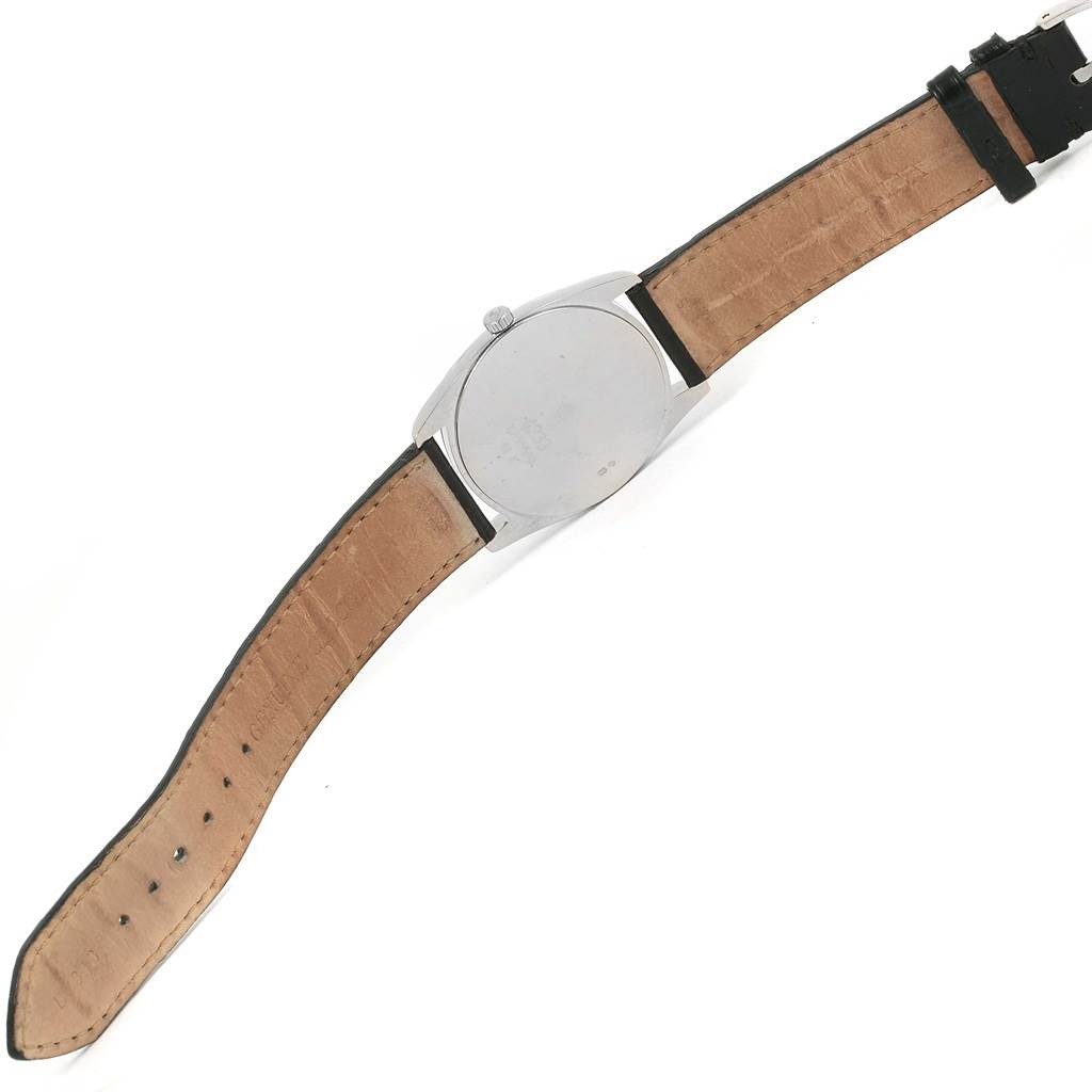 The image shows the back case and strap of a Rolex Cellini 4233 White Gold Black Dial 4233 White Gold Black Dial watch from a slightly angled top-down view.