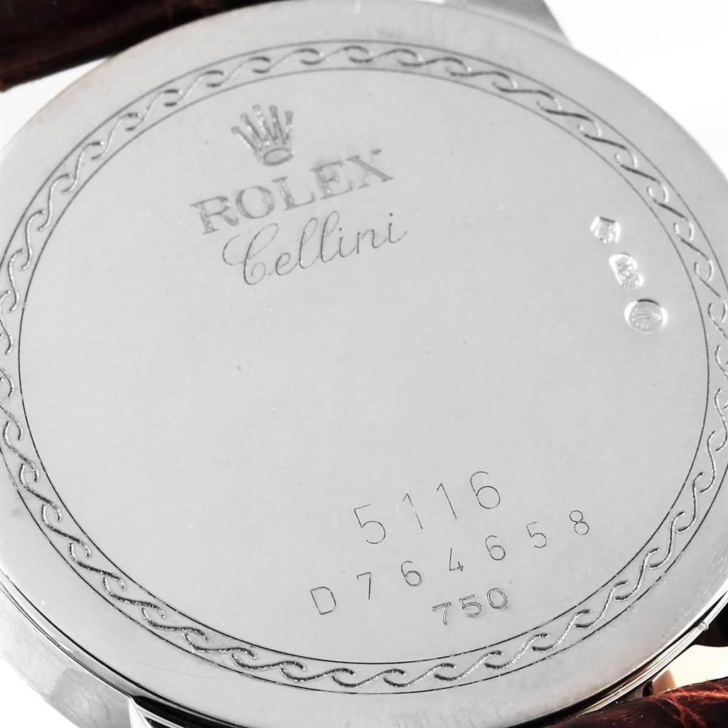 This image shows the back case of a Rolex Cellini 5116 White Gold Silver Dial 5116 White Gold Silver Dial watch, including its engraved text and serial numbers.