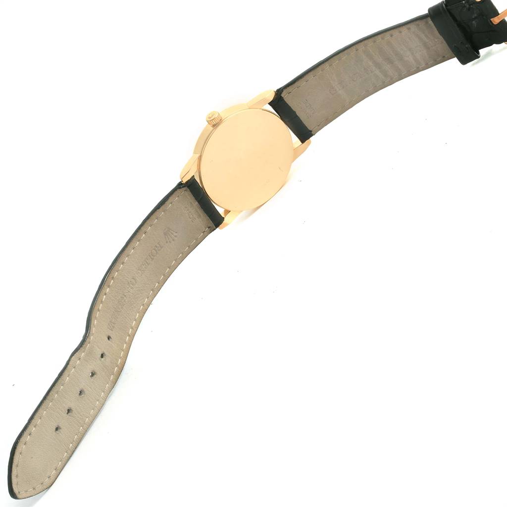 The image shows the back view of a Rolex Cellini 5116 Yellow Gold Grey Dial 5116 Yellow Gold Grey Dial watch, with its strap extended and the case back and crown visible.