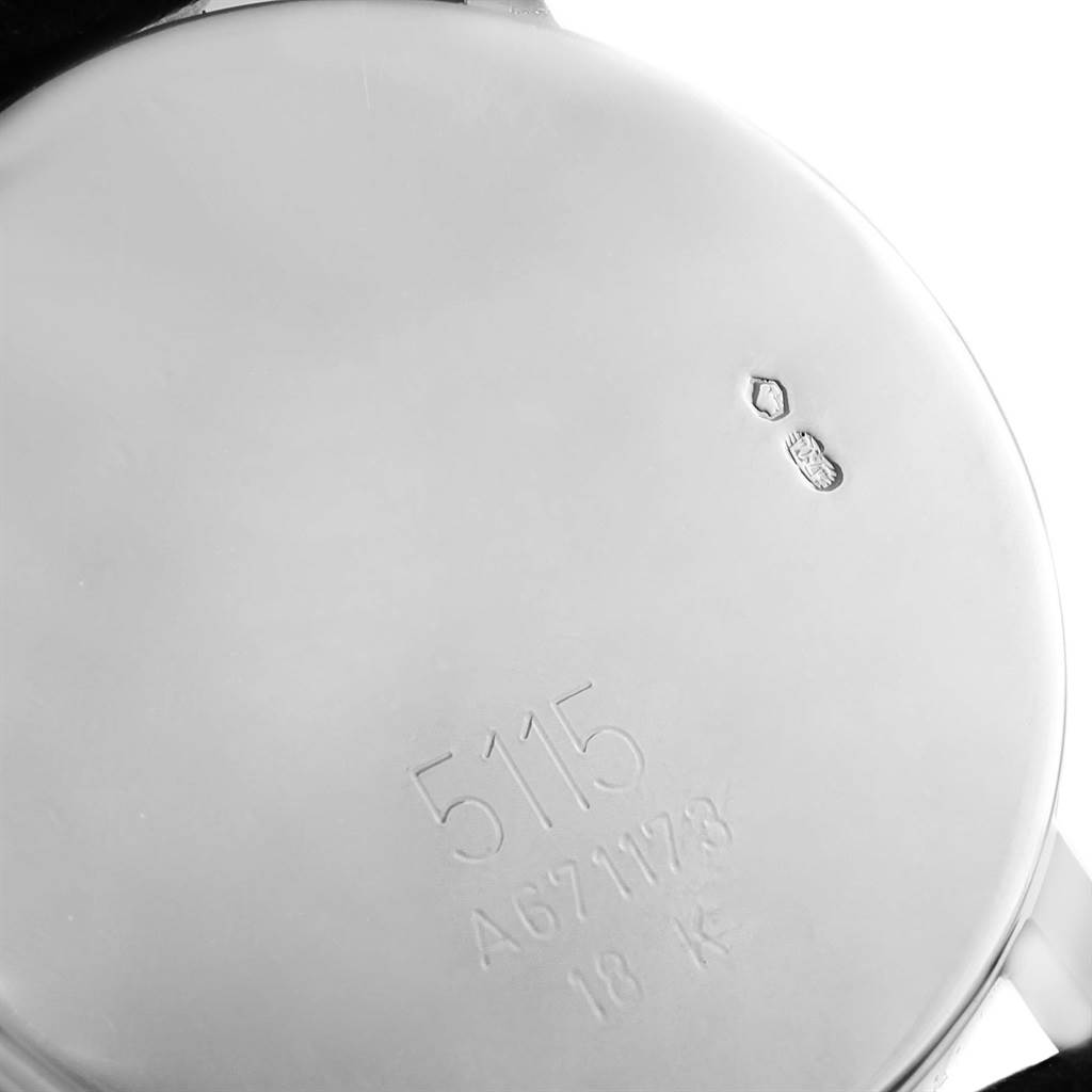 The image shows the back case of a Rolex Cellini 5115 White Gold Black Dial 5115 White Gold Black Dial watch, including model number, serial number, and 18K gold hallmark.