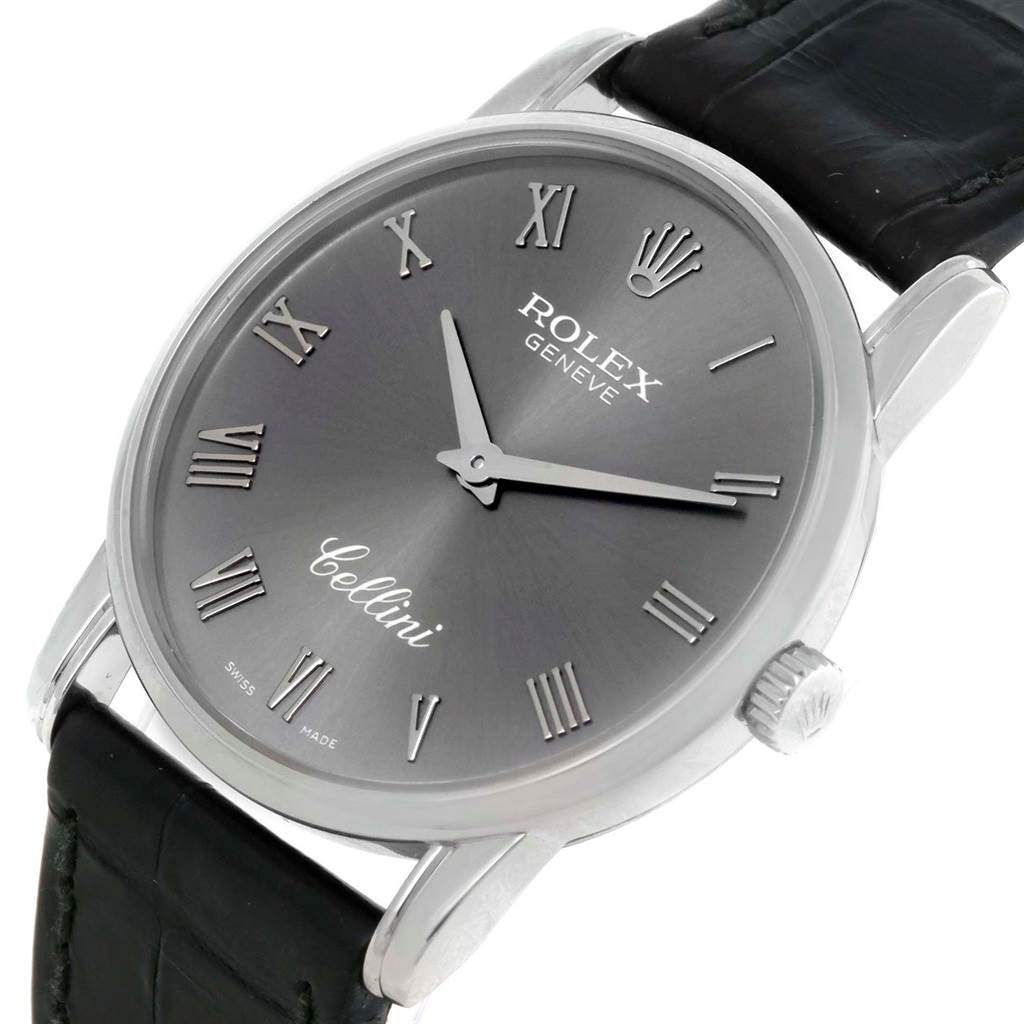 The Rolex Cellini 5116 Men's White Gold Grey Dial 5116 Men's White Gold Grey Dial watch is shown at an angled close-up, highlighting the dial, hands, crown, and leather strap.