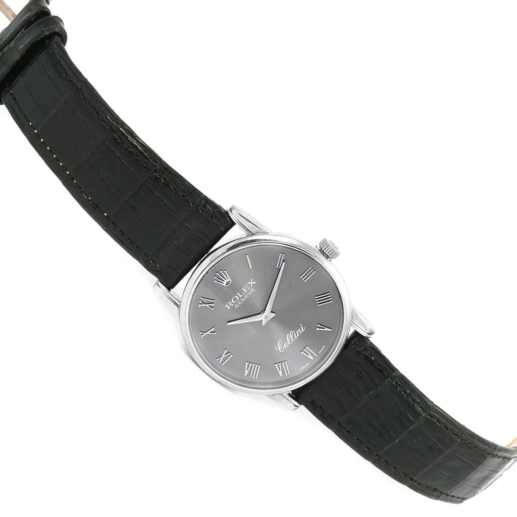 The image shows a top-down view of a Rolex Cellini 5116 Men's White Gold Grey Dial 5116 Men's White Gold Grey Dial watch, displaying its face, dial, hands, and strap.