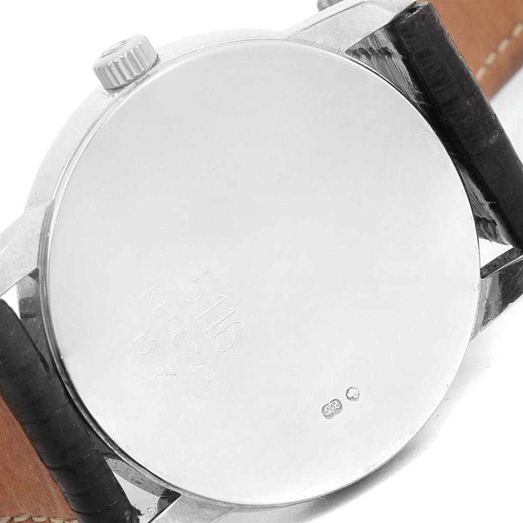 The image shows the back case of a Rolex Cellini 5116 Men's White Gold Grey Dial 5116 Men's White Gold Grey Dial watch, including the crown and leather strap attachments.