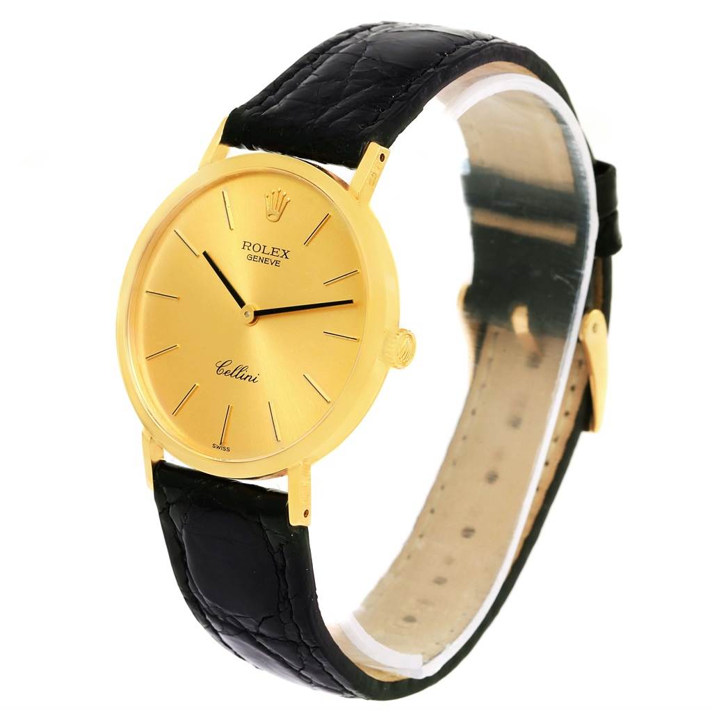 The image shows a Rolex Cellini 4112 Yellow Gold Champagne Dial 4112 Yellow Gold Champagne Dial watch at a three-quarter angle, displaying the gold face, black leather strap, and side profile.