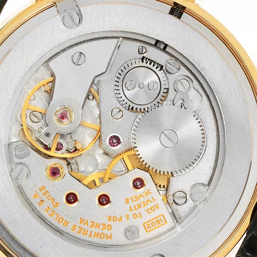 This is a close-up view of the Rolex Cellini 5115 Yellow Gold Beige Dial 5115 Yellow Gold Beige Dial model’s intricate watch movement components.