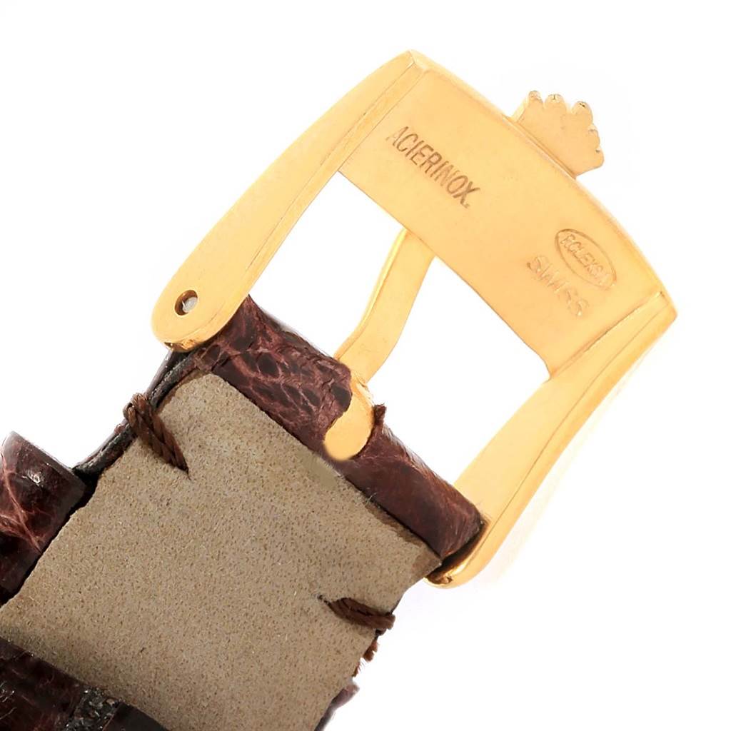 This image shows a close-up of the buckle and leather strap of a Rolex Cellini 5115 Men's Yellow Gold Grey Dial 5115 Men's Yellow Gold Grey Dial watch.