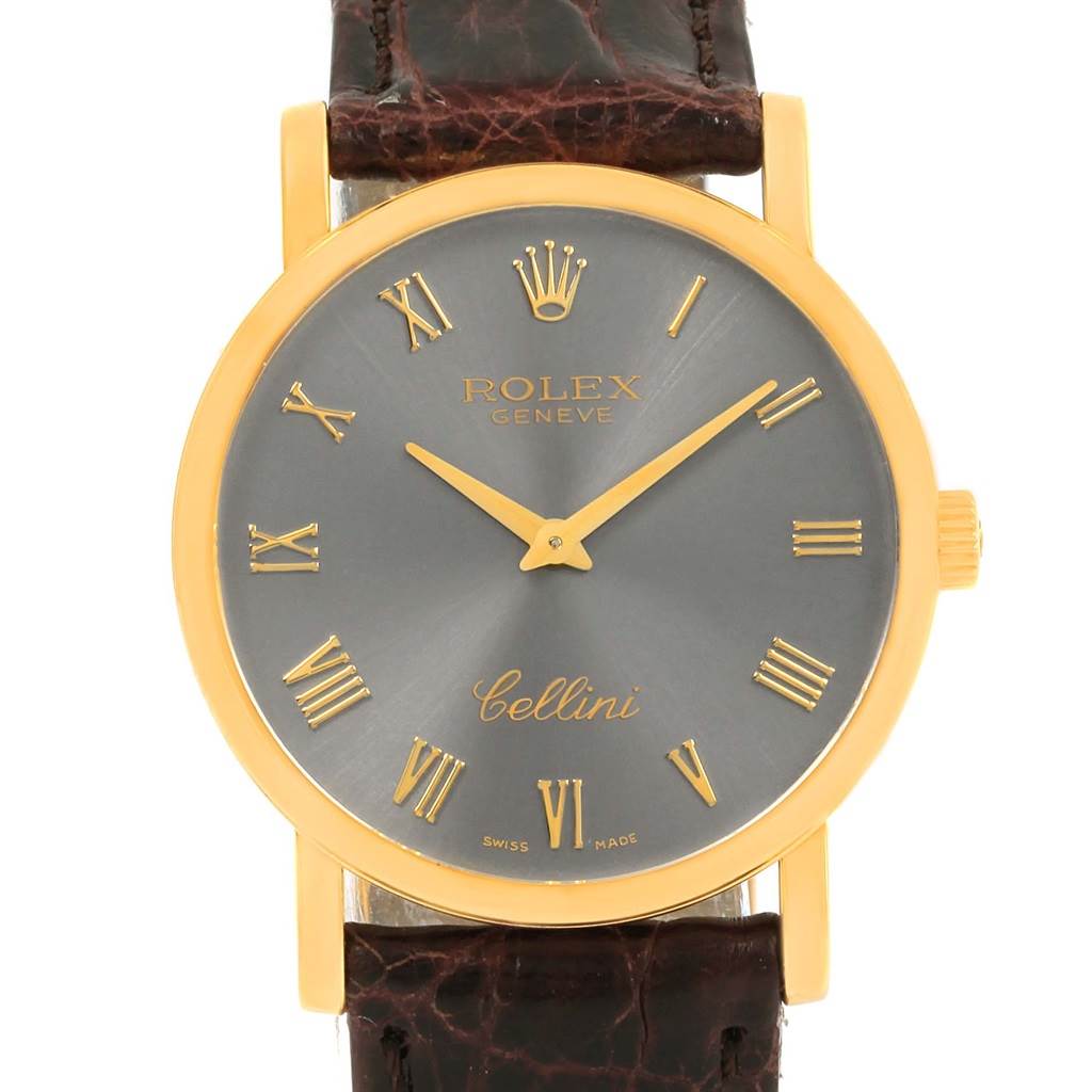 This image shows a Rolex Cellini 5115 Men's Yellow Gold Grey Dial 5115 Men's Yellow Gold Grey Dial watch from a front angle, highlighting its dial, gold case, and leather strap.