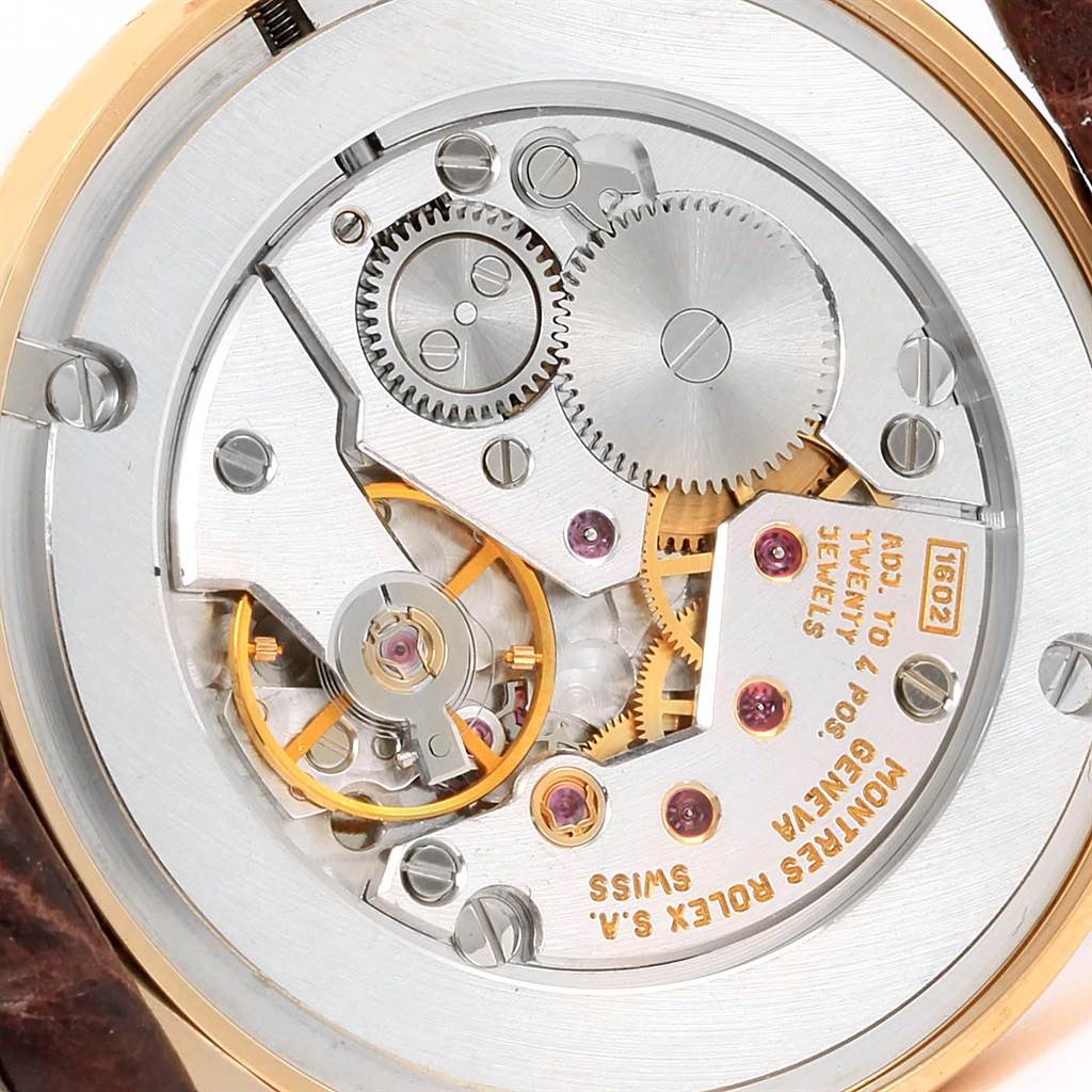The image shows the movement mechanism and internal components of a Rolex Cellini 5115 Men's Yellow Gold Grey Dial 5115 Men's Yellow Gold Grey Dial watch from a close-up rear angle.