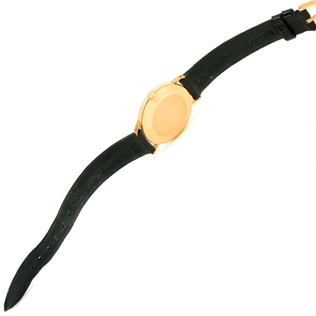 The image shows the back and side view of the Rolex Cellini 4112 Men's Yellow Gold Beige Dial 4112 Men's Yellow Gold Beige Dial watch, highlighting the gold case and black leather strap.