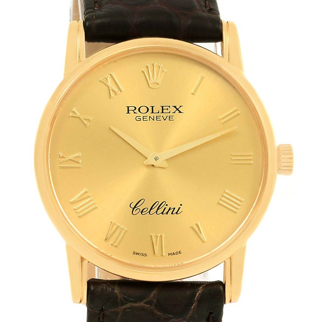 The image shows a front view of a Rolex Cellini 5116 Men's Yellow Gold Champagne Dial 5116 Men's Yellow Gold Champagne Dial watch, highlighting its gold dial, Roman numerals, and leather strap.