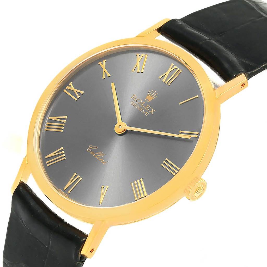 The image shows a Rolex Cellini 4112 Men's Yellow Gold Grey Dial 4112 Men's Yellow Gold Grey Dial watch from an angled top view, focusing on its dial, case, and partially visible strap.