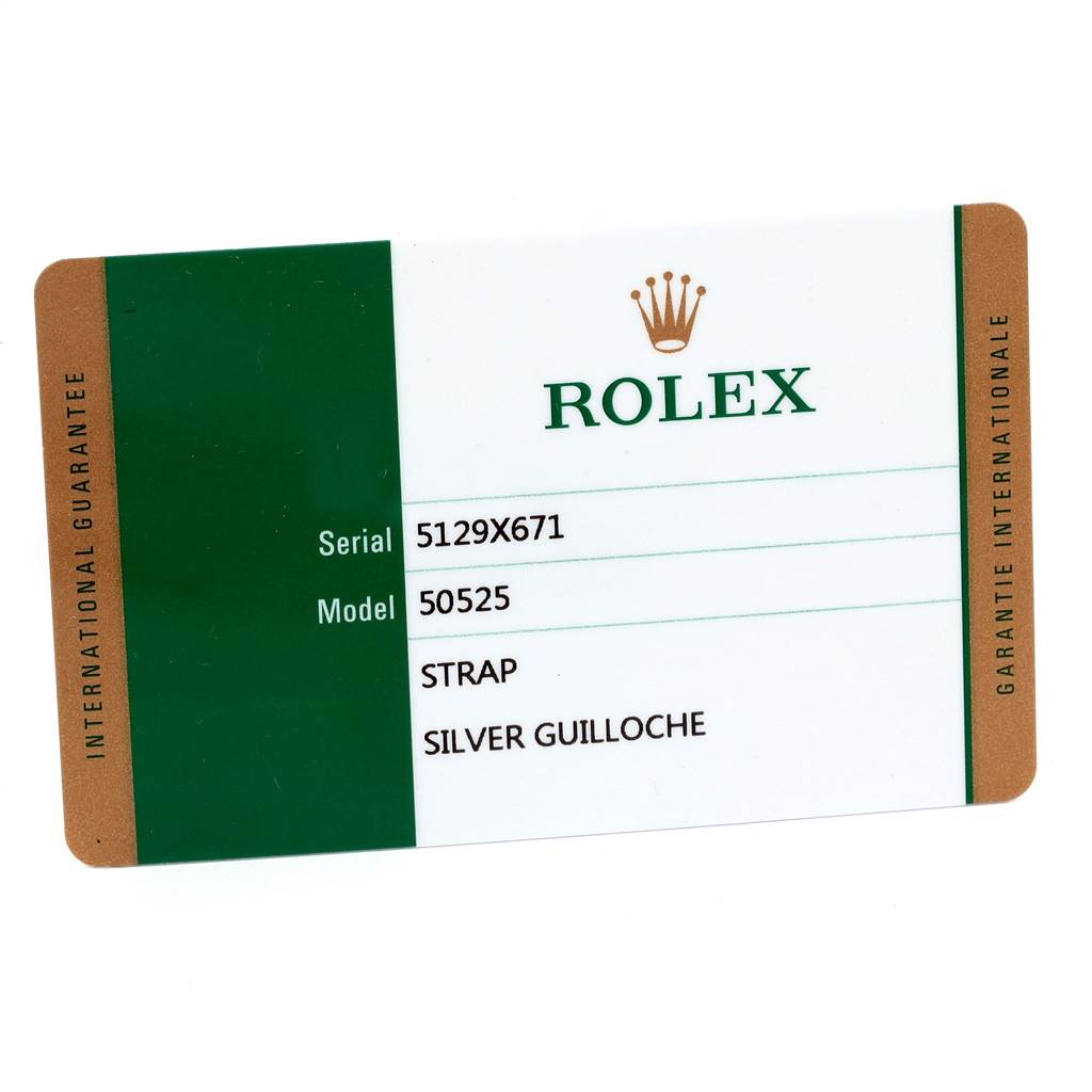The image shows an international guarantee card for a Rolex Cellini 50525 Men's Rose Gold Silver Dial 50525 Men's Rose Gold Silver Dial model 50525 with a strap and silver guilloche.