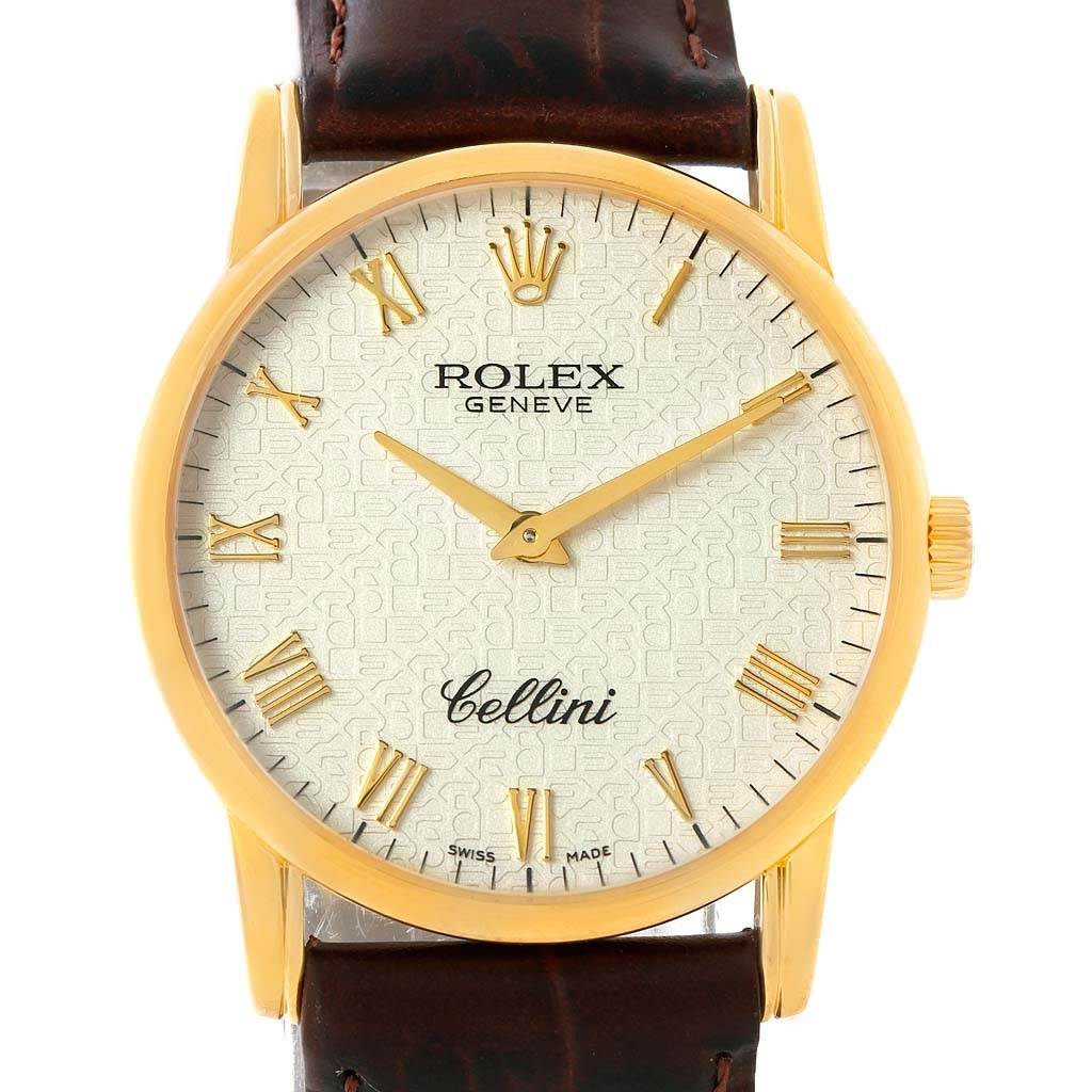 The image shows a frontal view of a Rolex Cellini 5116 Men's Yellow Gold Beige Dial 5116 Men's Yellow Gold Beige Dial watch featuring a leather strap and gold Roman numeral indices.