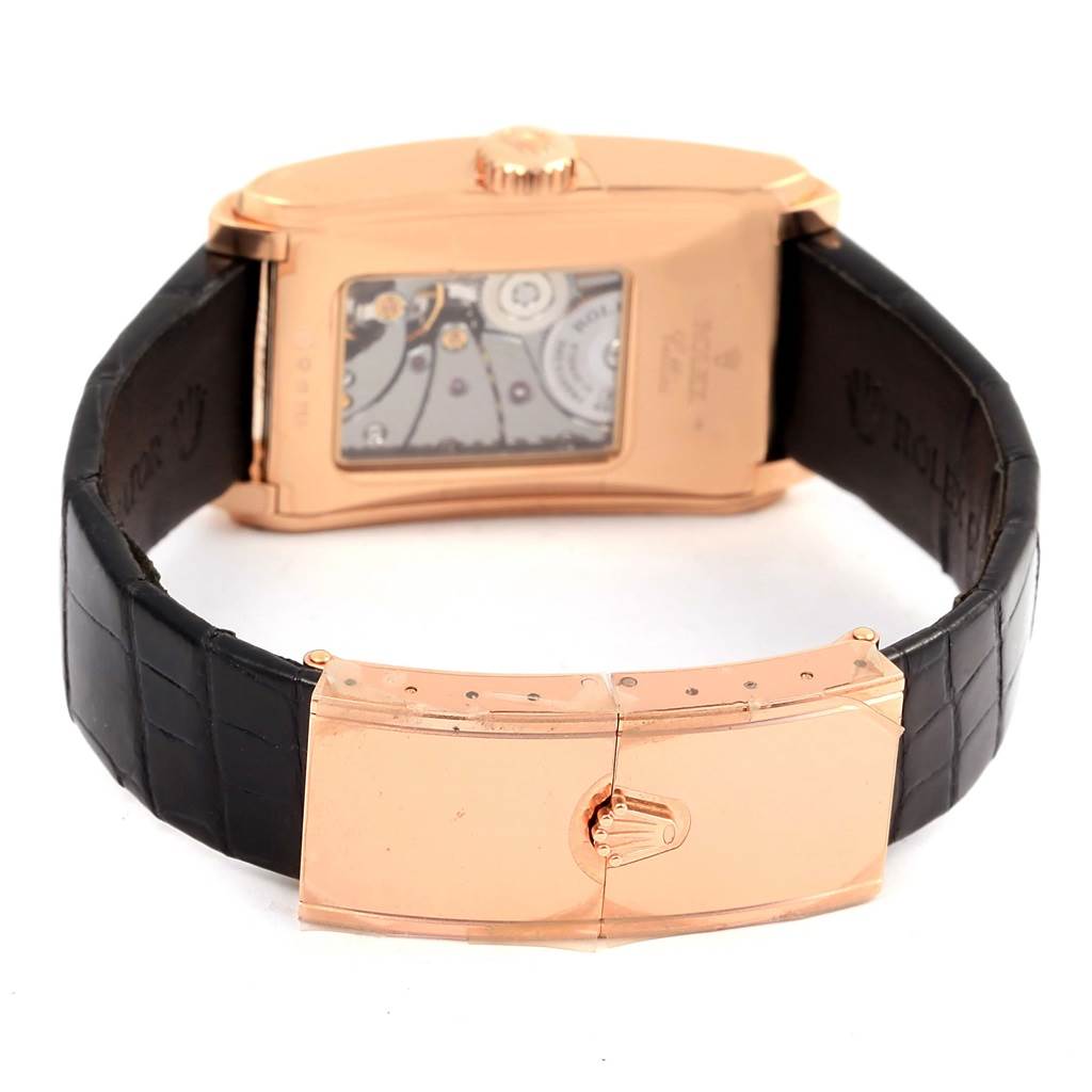 The image shows the back view of a Rolex Cellini 5442 Men's Rose Gold Black Dial 5442 Men's Rose Gold Black Dial watch, focusing on the movement and the clasp of the black leather strap.