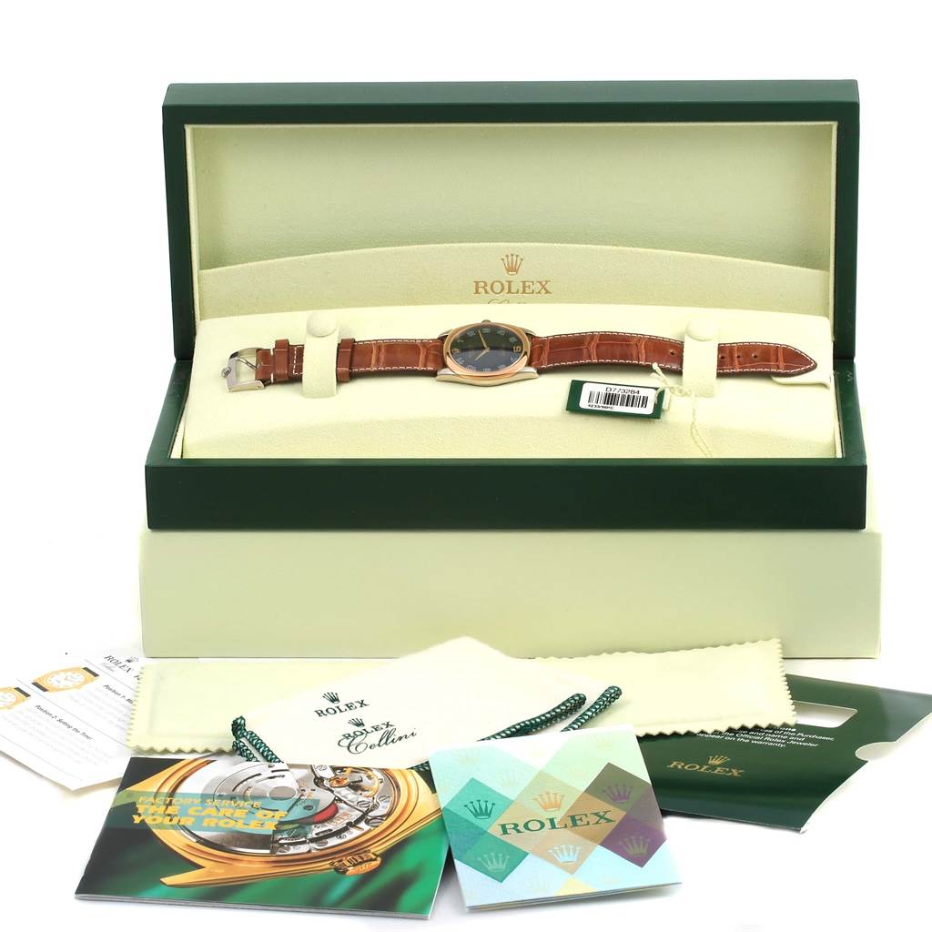 The image shows a Rolex Cellini 4233 Men's White Gold Black Dial 4233 Men's White Gold Black Dial watch in an open box, along with various accessories and booklets.