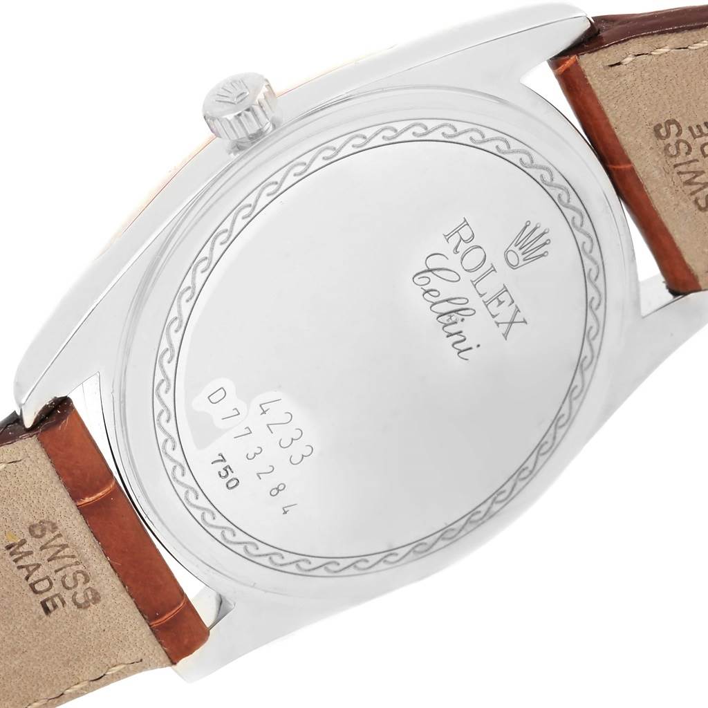 The image shows the back and side of a Rolex Cellini 4233 Men's White Gold Black Dial 4233 Men's White Gold Black Dial watch, highlighting the case back, crown, and part of the leather strap.