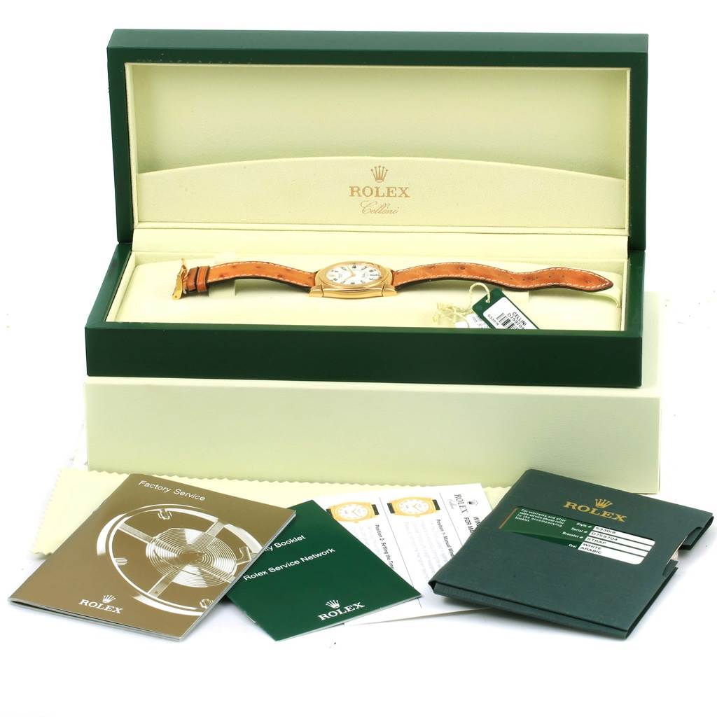 The image shows a Rolex Cellini 5330 Men's Yellow Gold White Dial 5330 Men's Yellow Gold White Dial watch laid flat in its open box, with accompanying booklets and warranty cards.