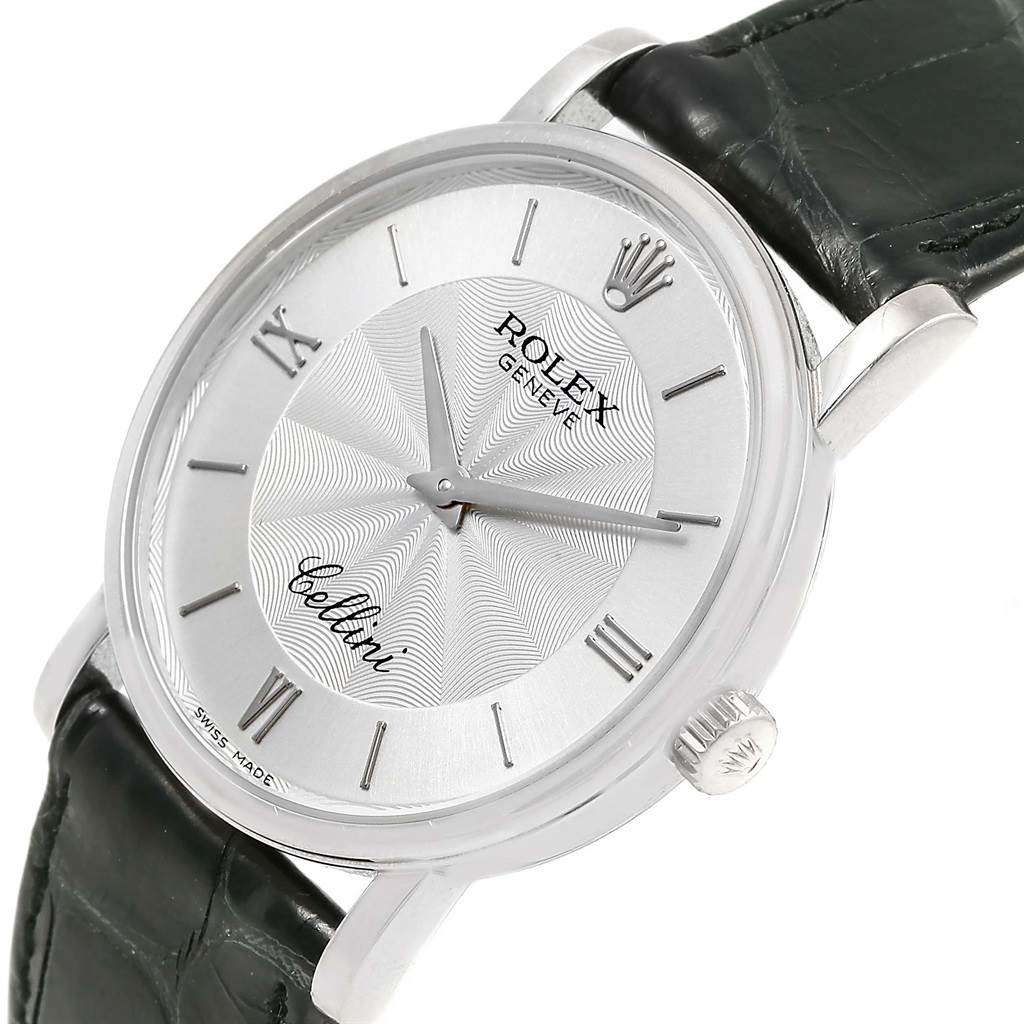 This image shows a Rolex Cellini 5115 White Gold Silver Dial 5115 White Gold Silver Dial wristwatch face at a slight angle, highlighting its dial, crown, and leather strap.