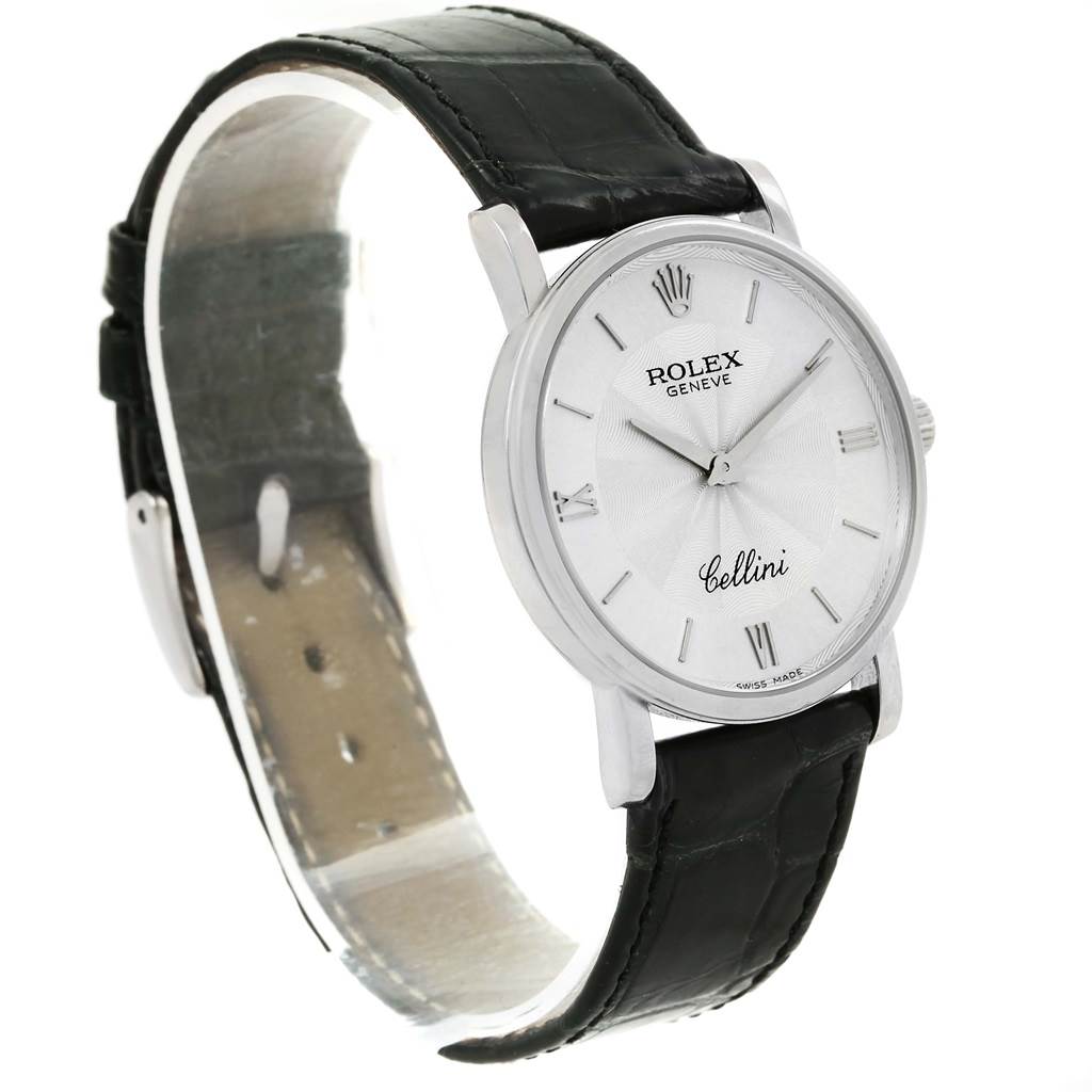 The Rolex Cellini 5115 White Gold Silver Dial 5115 White Gold Silver Dial watch is shown at a slight angle, displaying the face, bezel, case, crown, and black leather strap.
