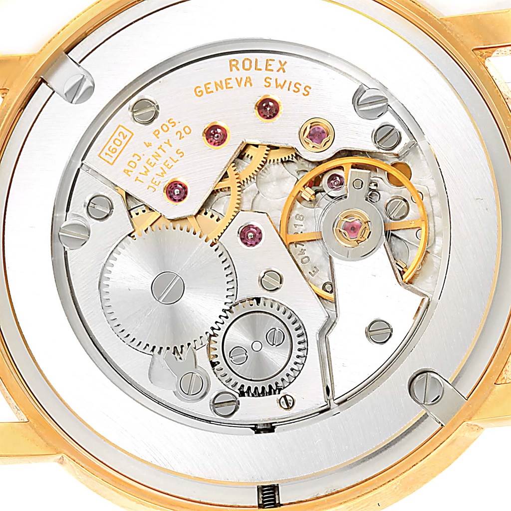 The image shows the back view of a Rolex Cellini 5115 Yellow Gold Mother of Pearl Dial 5115 Yellow Gold Mother of Pearl Dial watch, revealing its internal mechanical movement and components.