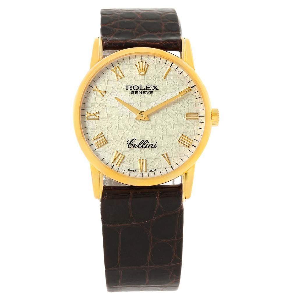 The Rolex Cellini 5116 Men's Yellow Gold Beige Dial 5116 Men's Yellow Gold Beige Dial watch is shown from a front view, displaying its gold bezel, textured dial, Roman numerals, and brown leather strap.