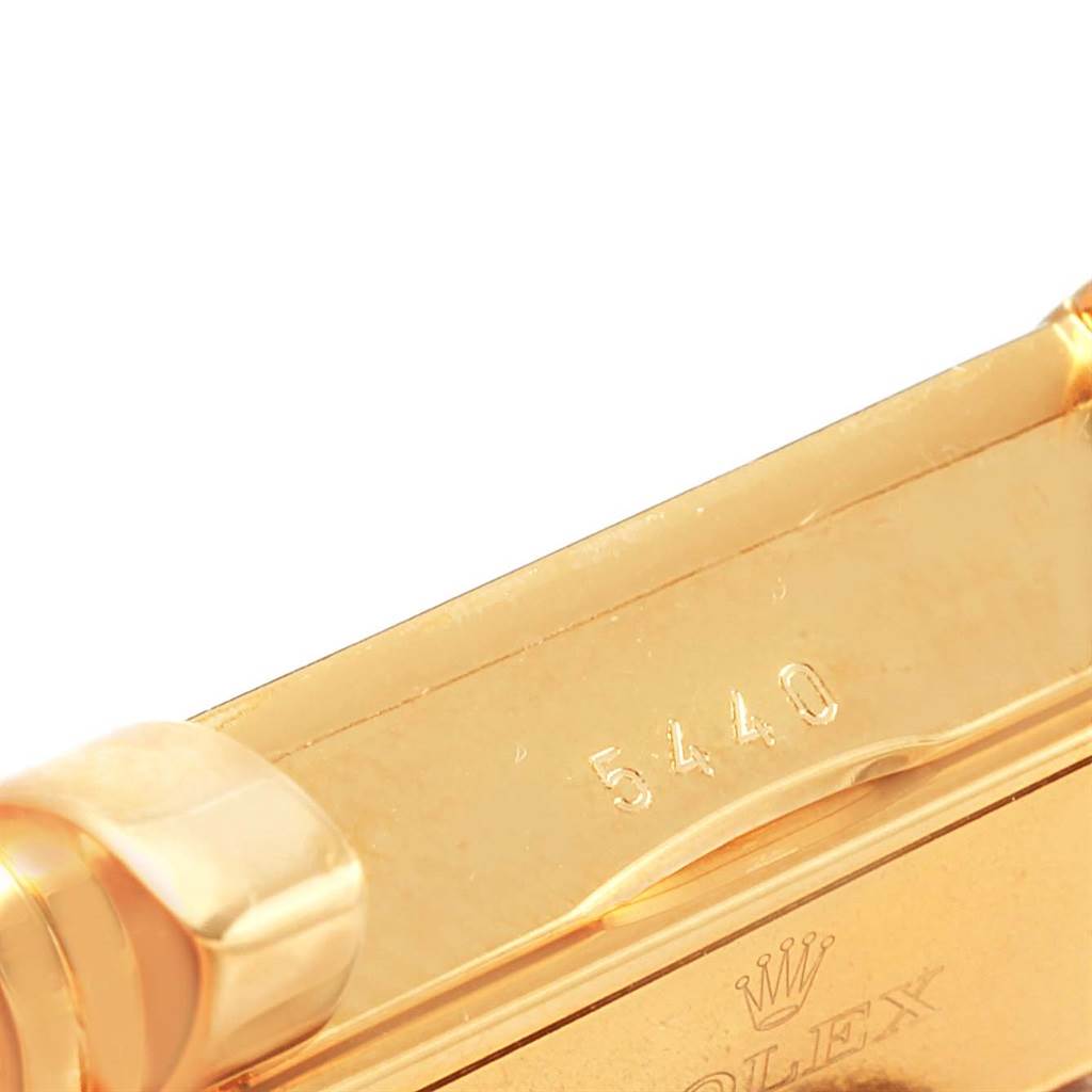 This image shows a close-up of the case and serial number on a Rolex Cellini 5440.8 Men's Yellow Gold Champagne Dial 5440.8 Men's Yellow Gold Champagne Dial watch.