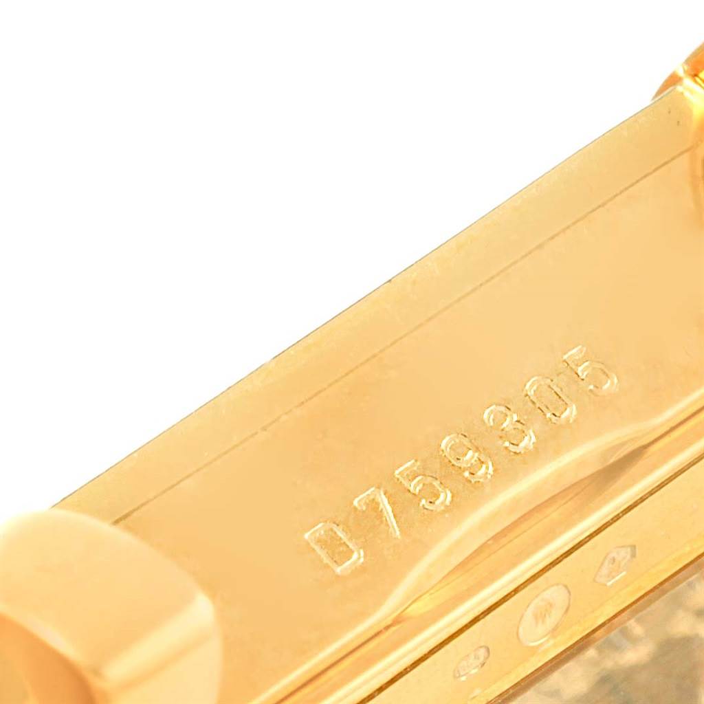 This is a close-up of the serial number engraving on the gold case of a Rolex Cellini 5440.8 Men's Yellow Gold Champagne Dial 5440.8 Men's Yellow Gold Champagne Dial watch.