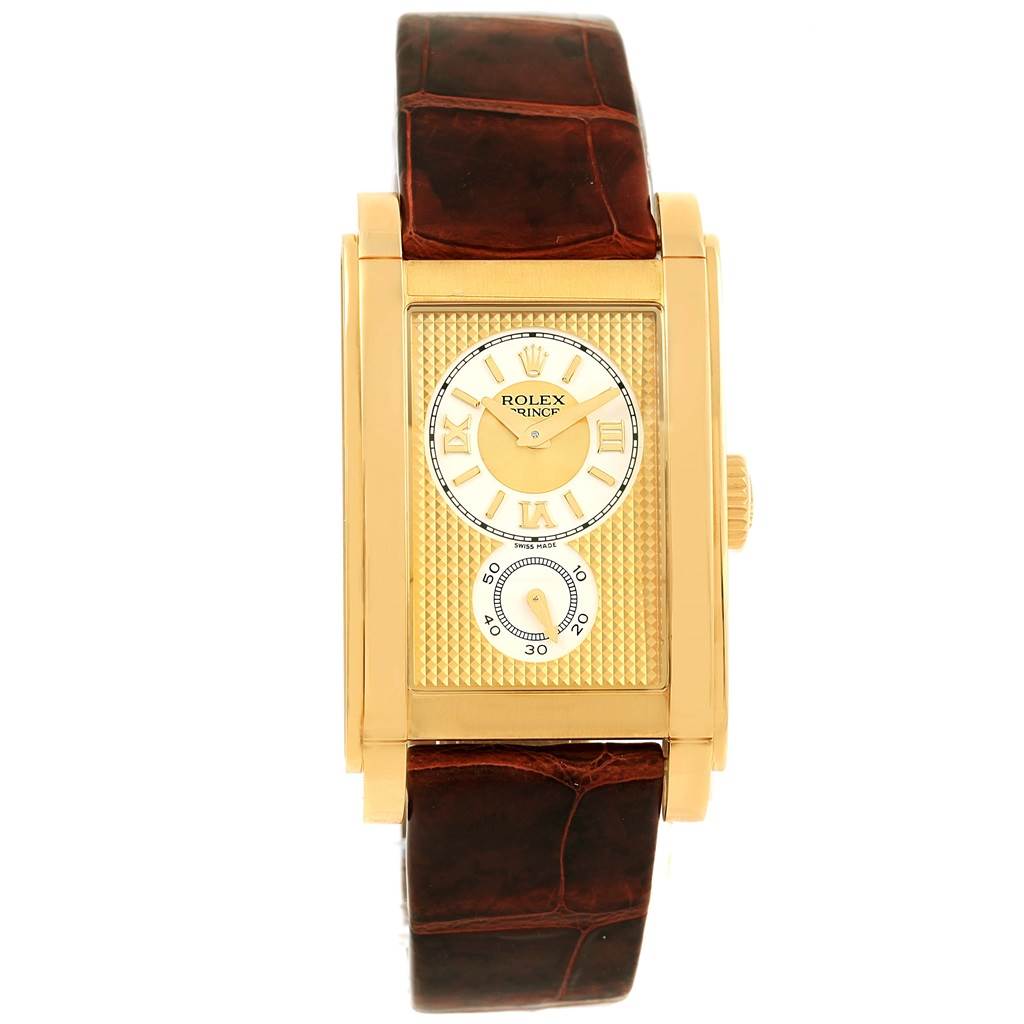 This image shows a frontal view of a Rolex Cellini 5440.8 Men's Yellow Gold Champagne Dial 5440.8 Men's Yellow Gold Champagne Dial Prince watch, highlighting its gold rectangular case, dial, and brown leather strap.