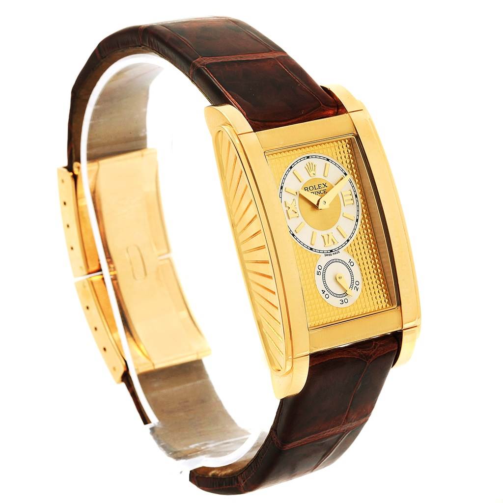 This image shows a Rolex Cellini 5440.8 Men's Yellow Gold Champagne Dial 5440.8 Men's Yellow Gold Champagne Dial watch at a slight angle, highlighting its gold rectangular case and brown leather strap.