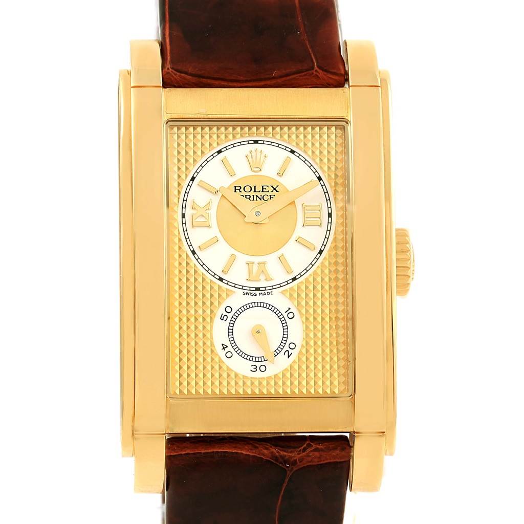 The image shows a front-facing angle of a Rolex Cellini 5440.8 Men's Yellow Gold Champagne Dial 5440.8 Men's Yellow Gold Champagne Dial Prince watch with a gold rectangular case and brown leather strap.
