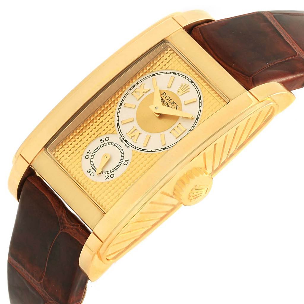 The image shows a close-up, angled view of a Rolex Cellini 5440.8 Men's Yellow Gold Champagne Dial 5440.8 Men's Yellow Gold Champagne Dial watch, highlighting its gold case, dial, and brown leather strap.